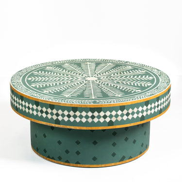 Bone inlay coffee table featuring intricate radial floral pattern in green and white, handcrafted furniture piece