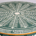 Bone inlay coffee table featuring intricate radial floral pattern in green and white, handcrafted furniture piece