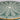 Bone inlay coffee table featuring intricate radial floral pattern in green and white, handcrafted furniture piece