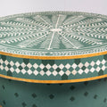 Bone inlay coffee table featuring intricate radial floral pattern in green and white, handcrafted furniture piece