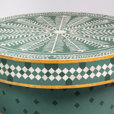 Bone inlay coffee table featuring intricate radial floral pattern in green and white, handcrafted furniture piece