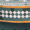 Bone inlay coffee table featuring intricate radial floral pattern in green and white, handcrafted furniture piece