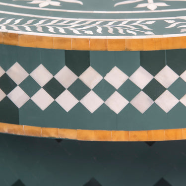 Bone inlay coffee table featuring intricate radial floral pattern in green and white, handcrafted furniture piece
