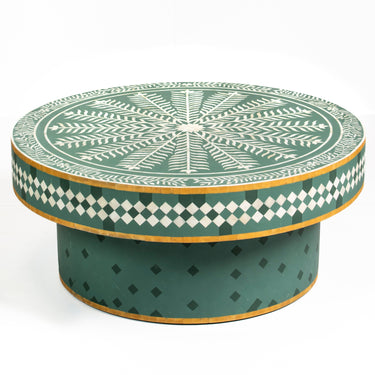 Bone inlay coffee table featuring intricate radial floral pattern in green and white, handcrafted furniture piece