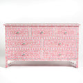 Mother of pearl inlay chest of drawers featuring intricate floral pattern in pink and white, handcrafted furniture piece