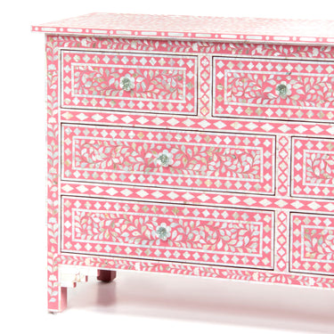 Mother of pearl inlay chest of drawers featuring intricate floral pattern in pink and white, handcrafted furniture piece