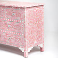 Mother of pearl inlay chest of drawers featuring intricate floral pattern in pink and white, handcrafted furniture piece