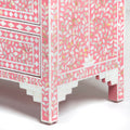 Mother of pearl inlay chest of drawers featuring intricate floral pattern in pink and white, handcrafted furniture piece
