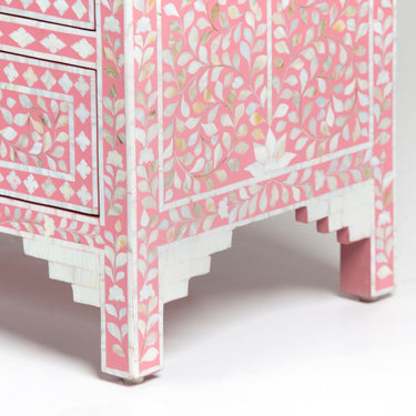 Mother of pearl inlay chest of drawers featuring intricate floral pattern in pink and white, handcrafted furniture piece