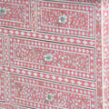 Mother of pearl inlay chest of drawers featuring intricate floral pattern in pink and white, handcrafted furniture piece