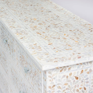 Mother of pearl inlay chest of drawers featuring intricate floral pattern in white and multitone, handcrafted furniture piece