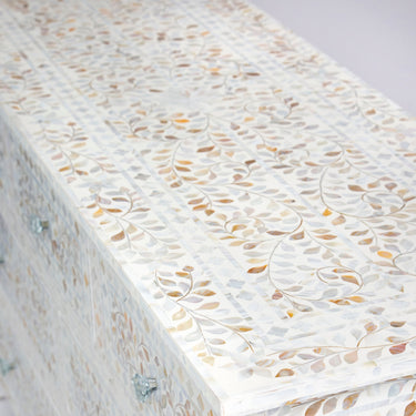 Mother of pearl inlay chest of drawers featuring intricate floral pattern in white and multitone, handcrafted furniture piece