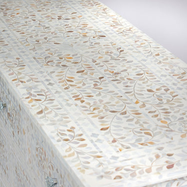 Mother of pearl inlay chest of drawers featuring intricate floral pattern in white and multitone, handcrafted furniture piece