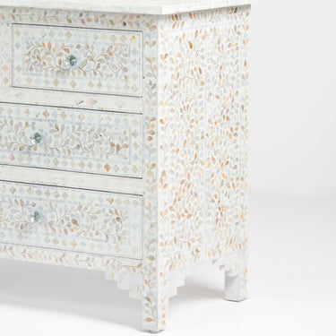 Mother of pearl inlay chest of drawers featuring intricate floral pattern in white and multitone, handcrafted furniture piece