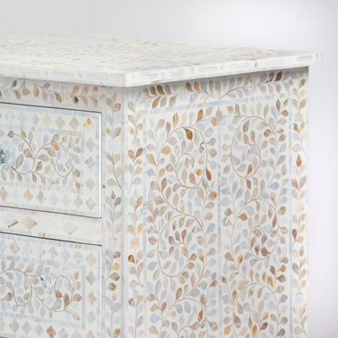 Mother of pearl inlay chest of drawers featuring intricate floral pattern in white and multitone, handcrafted furniture piece