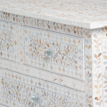 Mother of pearl inlay chest of drawers featuring intricate floral pattern in white and multitone, handcrafted furniture piece